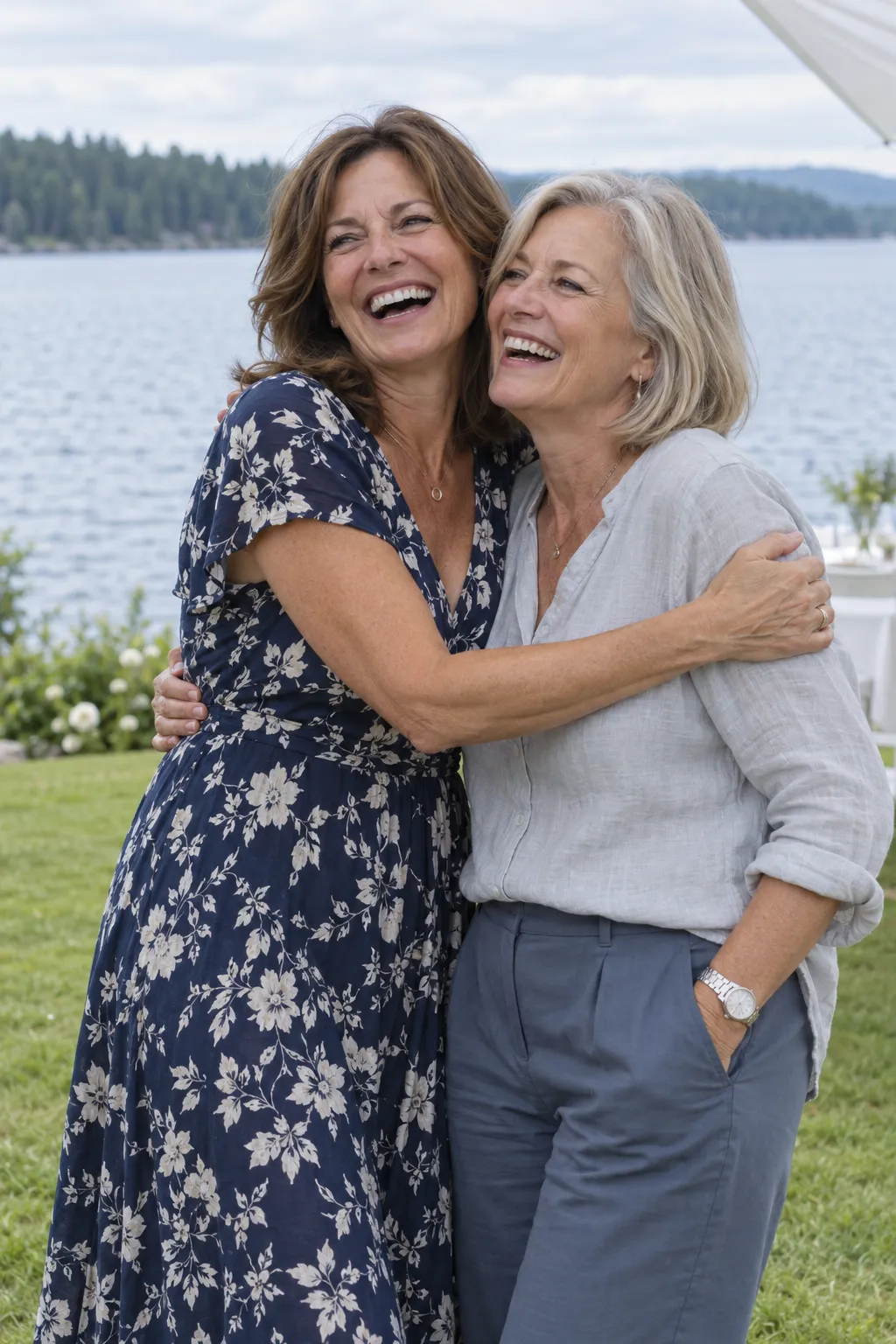 Two friends hugging on the lawn